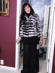 Thick American housewife disrobes down to her underware when home alone