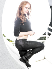 Hawt redhead stands stripped in boots after a striptease out of jeans