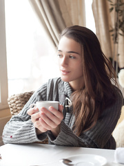  Penelope in underware & red nylons undressing to show her juvenile body