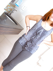 Cute redhead removes her leggings and pretties to pose stripped for the 1st time