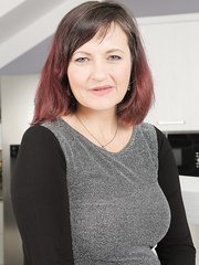 Aged woman Justina does a striptease previous to fingering her cum-hole