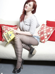 Chunky redhead Jaye Rose exposes her large natural scones in hawt pantyhose and pants
