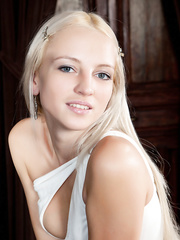 Fleshly blond legal age teenager Alysha removes her costume to show off her bawdy cleft