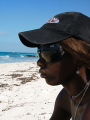 Ebon petite tit hottie Maria L receives stripped at the beach and exposes her black snatch