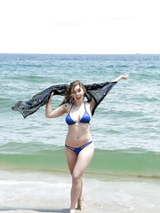 Beach honey Lena Paul freeing priceless love melons from bikini by swimming pool