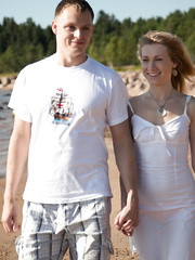 Youthful hotty with naturally golden-haired hair acquires team-fucked on beach by the ocean