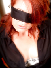 A host of mostly dressed honeys struggle against rope bindings and blindfolds