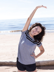 1St timer Laimites widens her unshaved cunt wide open at the beach