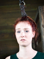 Pale redhead Ashley Lane submits to spending a day of her life in thraldom