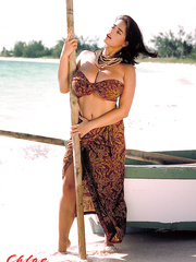 Chloe Vevrier stands in nature's garb at the beach and delights with her premium love muffins