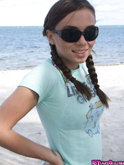 Fascinating legal age teenager beauty Alexiss Capri showing off valuable butt in strap underclothes on beach