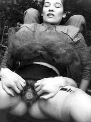 Vintage porn queens lifting their skirts to show off their unshaved snatch
