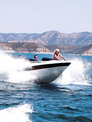 Breasty golden-haired Stacy Silver gets open throat cumshots after a double penetration on speedboat