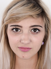 Legal Age Teenager Karolina hopes to break into porn by peeling her short petticoat to pose exposed