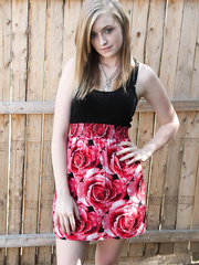 Slim blond Mandy climbs out of her short suit to disclose her tiny whoppers