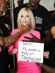 Diminutive golden-haired whore sucks off a roomful of large dark rods previous to masturbating