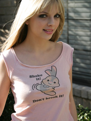 Pleasing golden-haired legal age teenager Jana Jordan flashes upskirt pants whilst eating chocolate