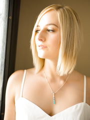 Juvenile golden-haired gal uncovers her somewhat merry love muffins as this babe acquires nude