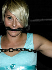 Blond female Vendetta is topped by Claire Adams in a maternity brassiere