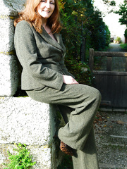 Redhead mature flashes outside then reveals all inside