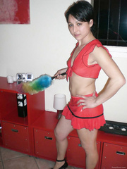 Stunning wife cleaning around the house wearing very short skirt and t