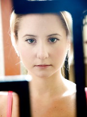 Youthful golden-haired cutie Odette Delacroix is restrained by a pair of lesbo Dommes