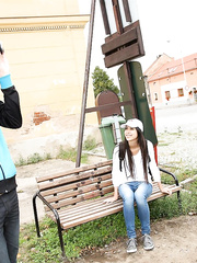 Youthful dark brown bangs a lad that babe just met on blanket in a field