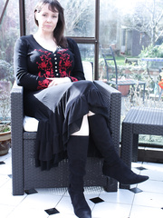 Sexy aged wife sheds lengthy petticoat to pose in boots with saggy mangos hanging