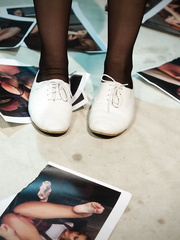 White nurse Dana DeArmond displays her glamorous feet after disrobing