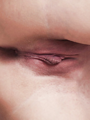 Sultry black haired Sha Rizel on her knees in nature's garb with giant large meatballs hanging