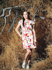 Cute little Li Moon flashes a exposed upskirt outdoors previous to stripping off