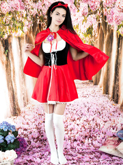 Darksome haired legal age teenager beauty undresses off red hiding hood outfit & over the knee socks