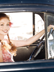 Natural redhead Scarlett Keegan removes petticoat to pose bare in heels outdoors