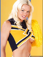 Breasty cheerleader Rhylee Richards demonstrates comely melons and a-hole