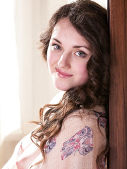 Darksome haired Conchita baring large teats & opening legs to flaunt trimmed fur pie