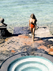 Vintage centerfold Terri Welles baring her large whoppers and bushy cunt outdoors