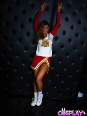 Cheerleader Elizabeth Bally frees large titties from uniform in advance of masturbating