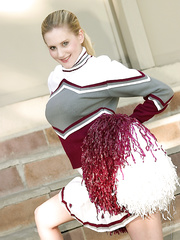 Cheerleader Anika is demonstrating her twat out of white pants