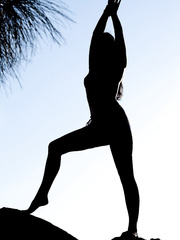 Indian accessories barely cover Winona West's melons and cookie in a canyon