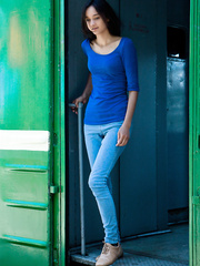 Slim legal age teenager Chandra posing with her shirt open and showing off a hirsute beaver