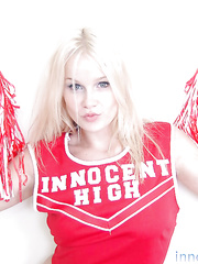 Schoolgirl cheerleader Kylee is a golden-haired sweetheart that is undressing for us