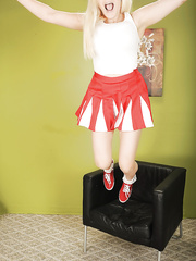 Chesty youthful golden-haired cheerleader Prudence Pond flashing upskirt pants