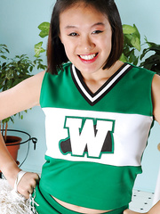 Non-Professional Oriental cheerleader baring large arse and breasts in advance of widening beaver
