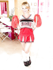 eighteen year old cheerleader Aurora Monroe disrobes off her cute uniform