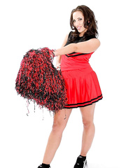 Brunette Hair cheerleader Kelly Divine flaunts her soaked in the stripped