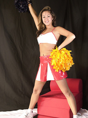 Non-Professional Latin Chick hottie Mailia releasing small billibongs from cheerleader outfit