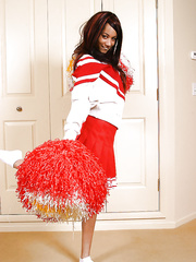 Non-Professional legal age teenager chick Mya Mason disrobes her red cheerleader uniform