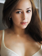 Juvenile underclothes model Miren exposing undressed pink fur pie for the 1st time