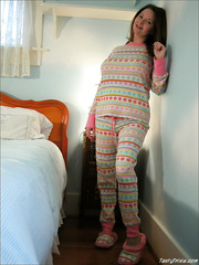 Aged woman Yummy Trixie sets her great scoops loose from pajamas on her sofa