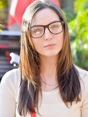 Bespectacled dark brown lass enjoys stripping and fingering her love tunnel